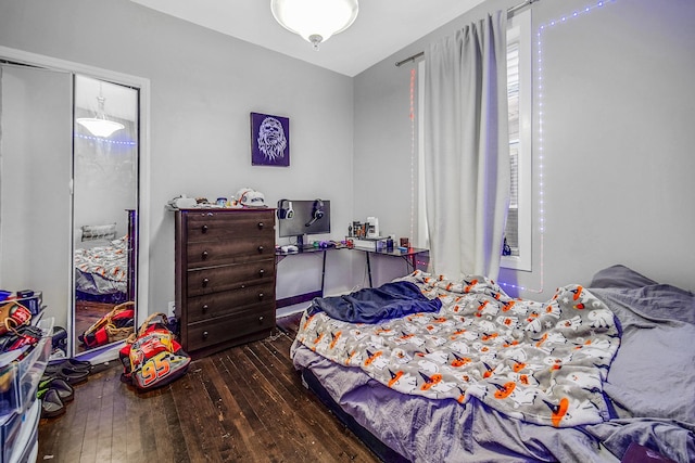 bedroom featuring wood-type flooring