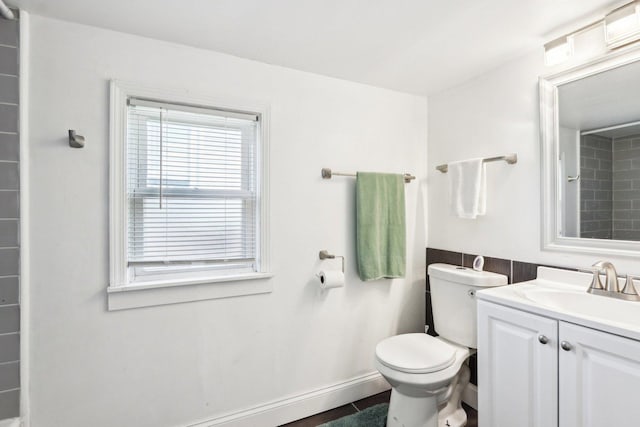 611 Mccarthy Rd, Lemont, IL 60439 - bathroom featuring toilet, vanity, and a shower