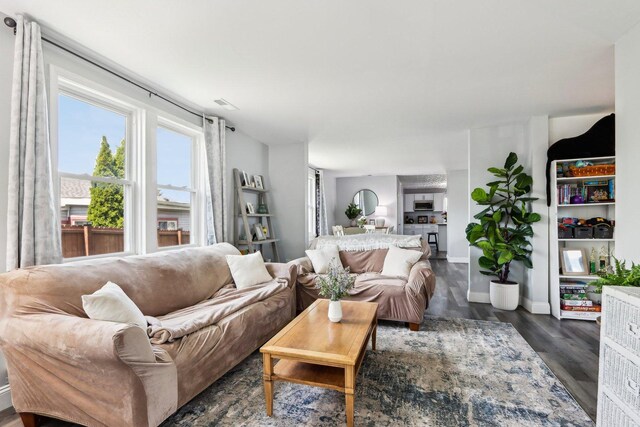 611 Mccarthy Rd, Lemont, IL 60439 - living area with dark wood-type flooring and baseboards