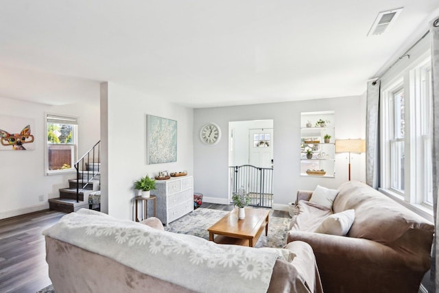 611 Mccarthy Rd, Lemont, IL 60439 - living area featuring wood finished floors, stairs, and baseboards