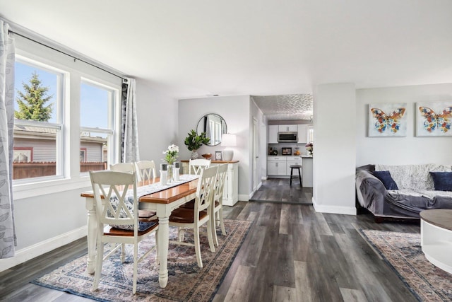 611 Mccarthy Rd, Lemont, IL 60439 - dining area featuring dark wood finished floors and baseboards