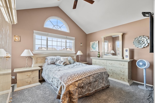 carpeted bedroom featuring baseboards, high vaulted ceiling, and a ceiling fan