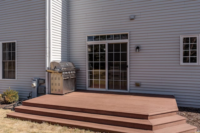 wooden deck featuring grilling area