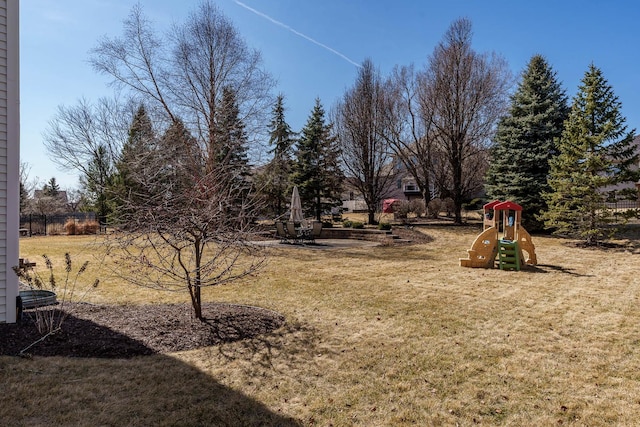 view of yard featuring a playground