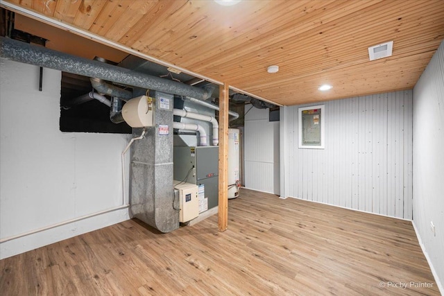 unfinished basement with wood finished floors and wooden ceiling