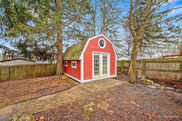 view of shed featuring a fenced backyard