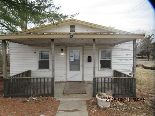 bungalow-style home with covered porch