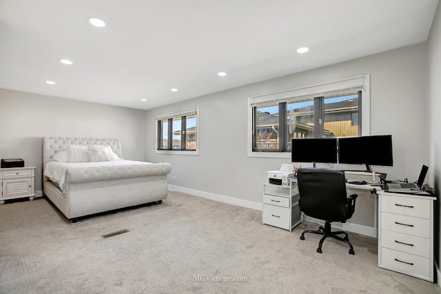 bedroom with recessed lighting, visible vents, baseboards, and light colored carpet