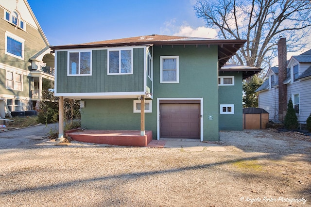 view of front of home with driveway and an attached garage