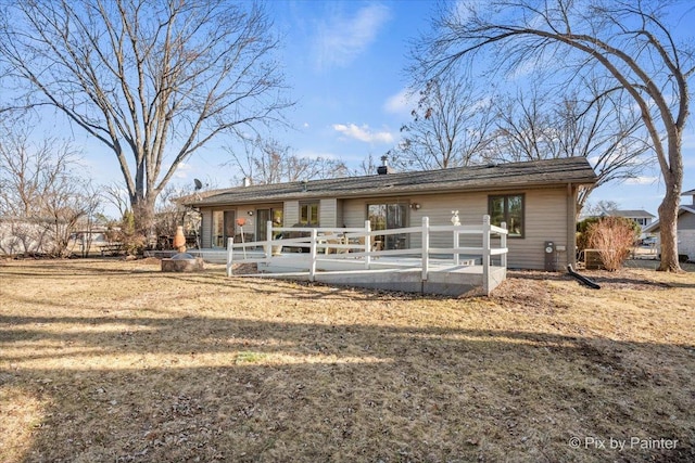 back of house with a patio