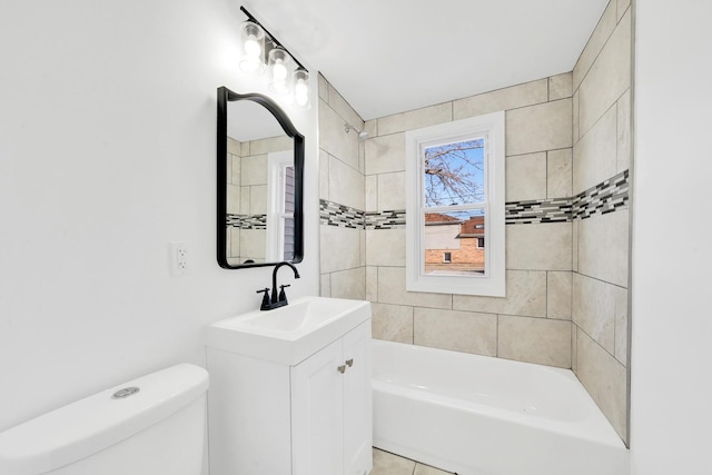 bathroom with shower / washtub combination, toilet, and vanity