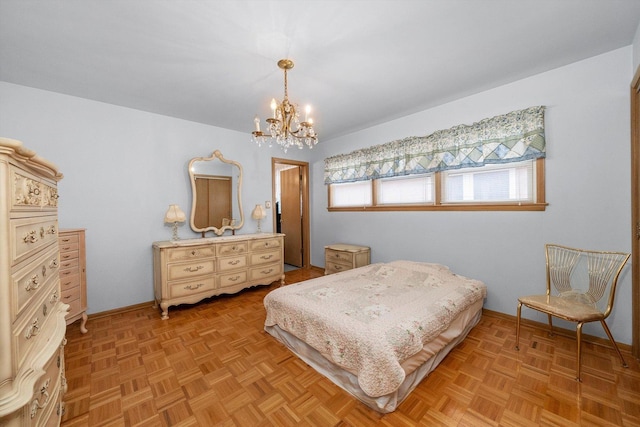 bedroom with an inviting chandelier