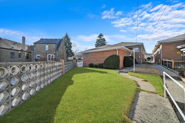 view of yard featuring a fenced backyard