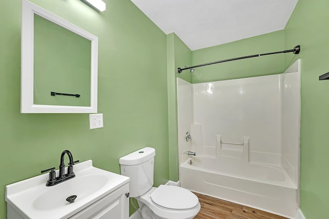 full bathroom with vanity, toilet, shower / bath combination, and wood finished floors