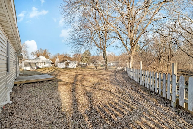 view of yard with a residential view and fence