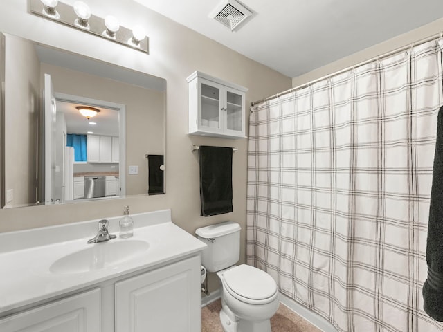 bathroom with visible vents, curtained shower, toilet, and vanity