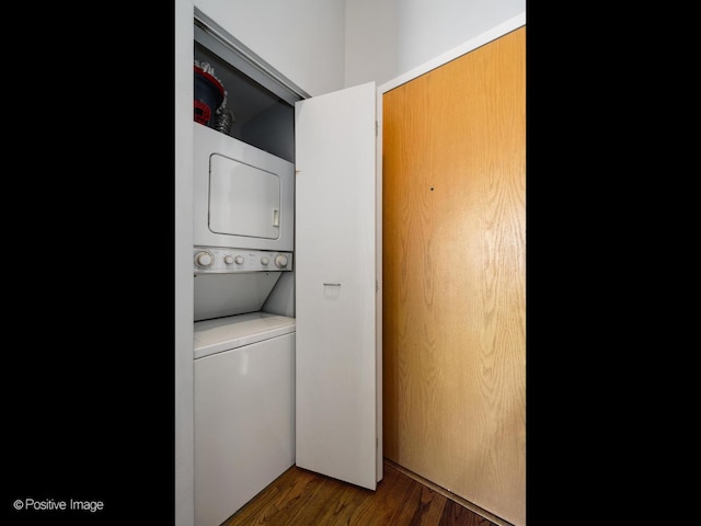 2333 W Saint Paul Ave Unit 331, Chicago, IL 60647 - laundry room featuring stacked washer / drying machine and wood finished floors