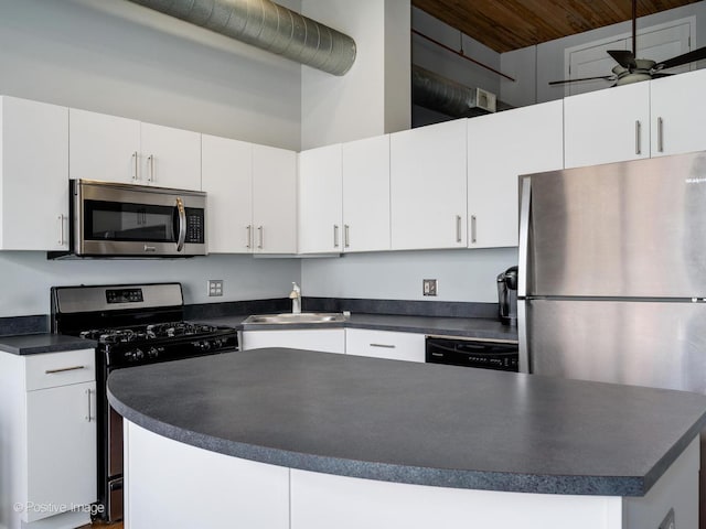 2333 W Saint Paul Ave Unit 331, Chicago, IL 60647 - kitchen featuring stainless steel appliances, dark countertops, white cabinetry, and wood ceiling