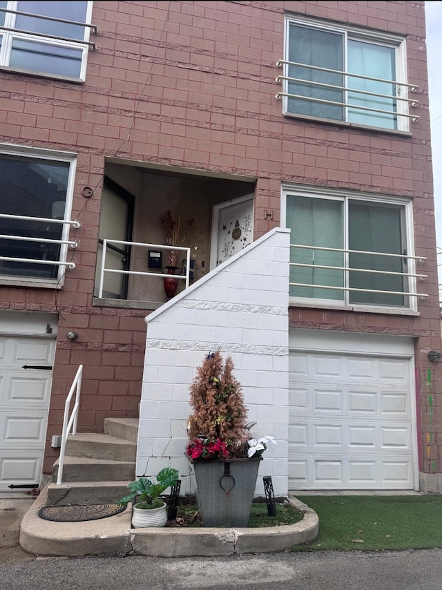 property entrance featuring a garage