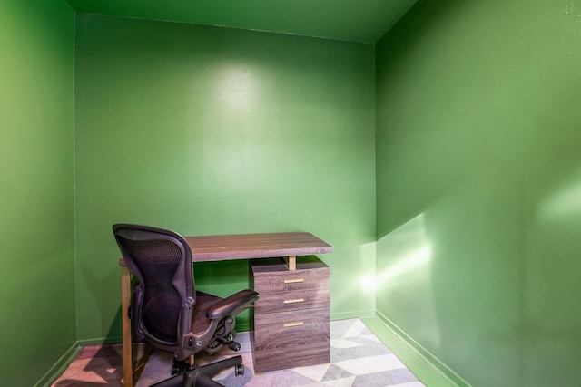 office space featuring baseboards