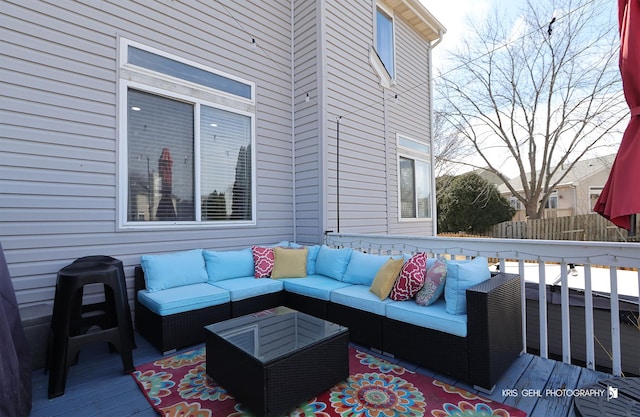 wooden terrace featuring an outdoor hangout area