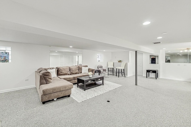 living room featuring carpet, recessed lighting, baseboards, and visible vents