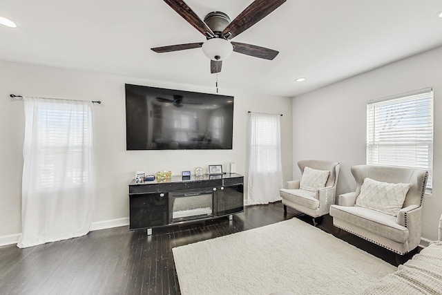 living room featuring recessed lighting, wood finished floors, baseboards, and ceiling fan