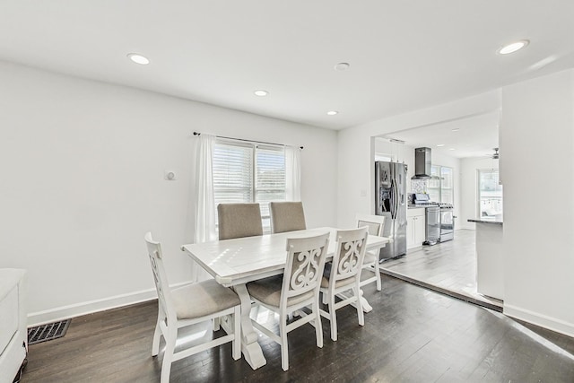 dining room featuring recessed lighting, wood finished floors, visible vents, and baseboards