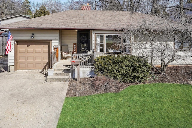 ranch-style home with a porch, roof with shingles, concrete driveway, an attached garage, and a chimney