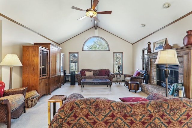 living room featuring ornamental molding, a glass covered fireplace, light colored carpet, ceiling fan, and vaulted ceiling with beams