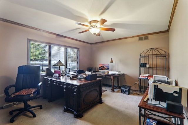 office area with visible vents, carpet, ceiling fan, and crown molding