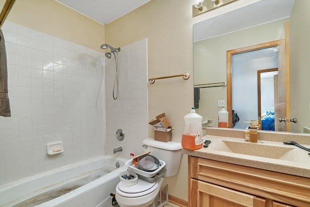 full bath featuring vanity, toilet, washtub / shower combination, and visible vents