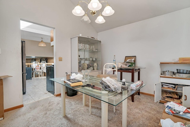 office space featuring lofted ceiling, a notable chandelier, baseboards, and carpet floors