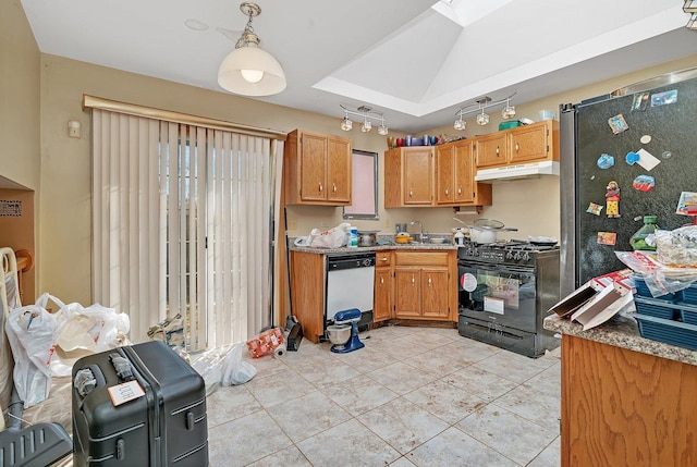 kitchen with under cabinet range hood, white dishwasher, light tile patterned flooring, gas stove, and a sink