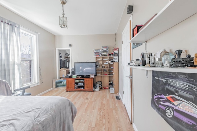 bedroom featuring light wood-type flooring