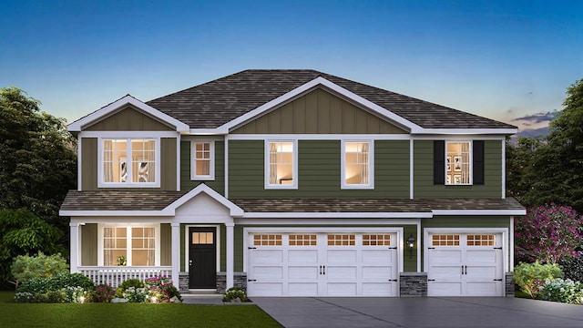 view of front of home with covered porch, board and batten siding, an attached garage, and driveway