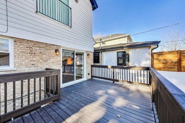 wooden deck featuring fence