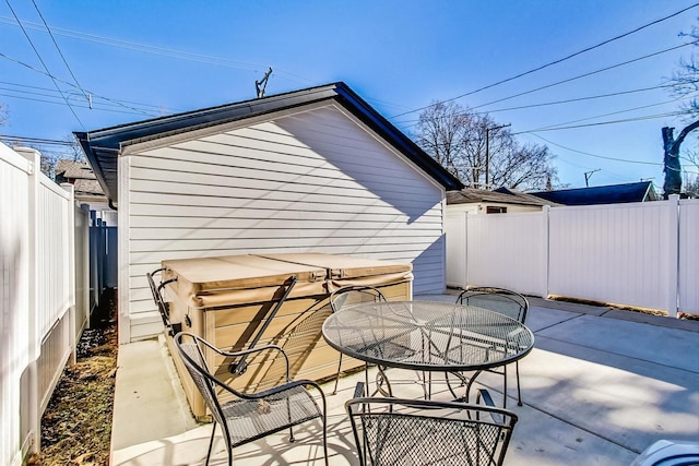 view of patio / terrace featuring outdoor dining area and a fenced backyard