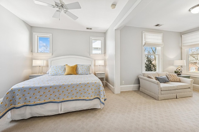 bedroom featuring visible vents, ceiling fan, baseboards, and carpet floors