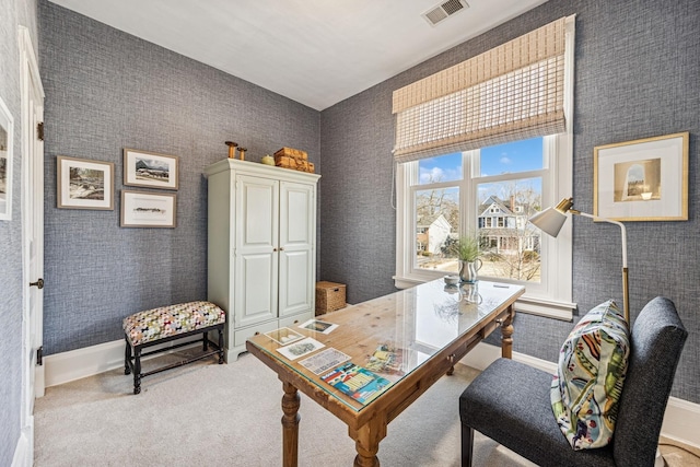 office space with baseboards, visible vents, wallpapered walls, and carpet