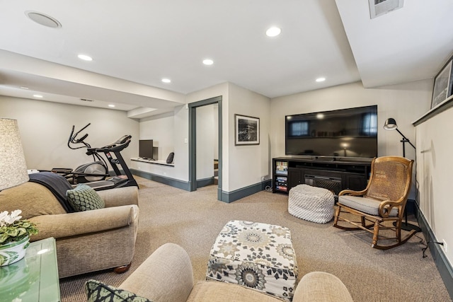 carpeted living area featuring recessed lighting, visible vents, and baseboards