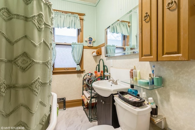 bathroom featuring marble finish floor, curtained shower, toilet, and vanity