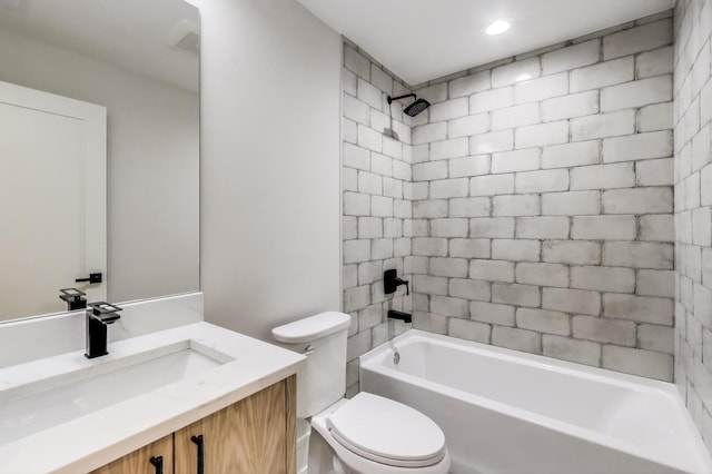 full bath featuring toilet, vanity, and  shower combination