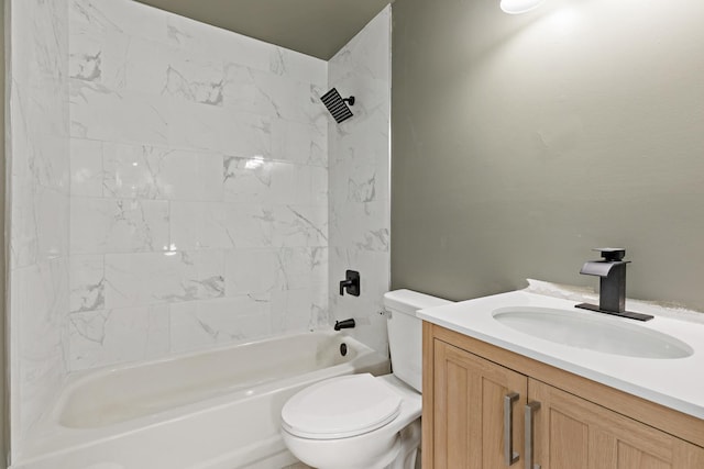 bathroom with toilet, vanity, and shower / tub combination