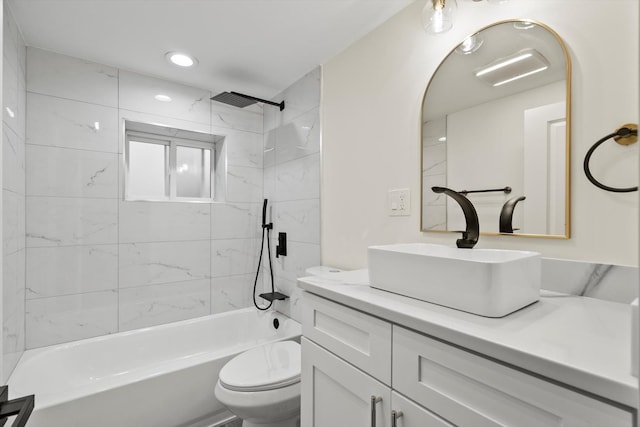 full bath with vanity, toilet, recessed lighting, and shower / washtub combination