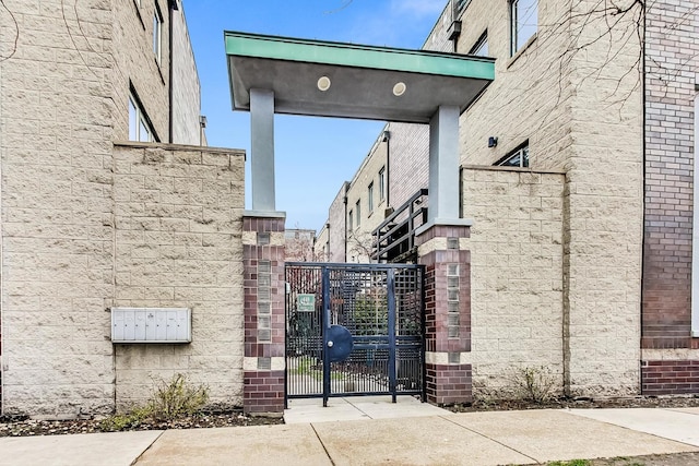 view of gate featuring fence