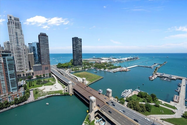 drone / aerial view with a water view and a view of city