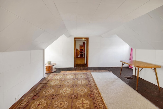 bonus room featuring lofted ceiling