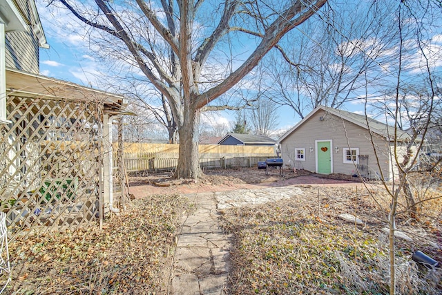 view of yard with fence