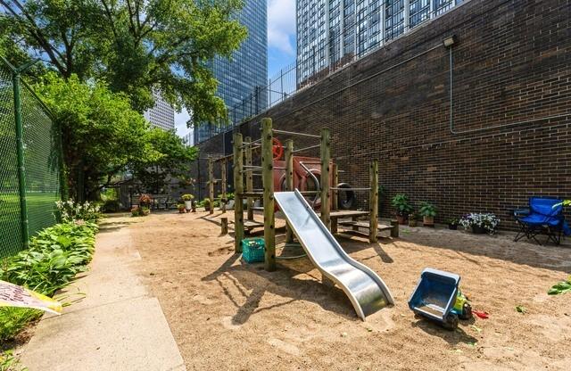 community play area featuring fence